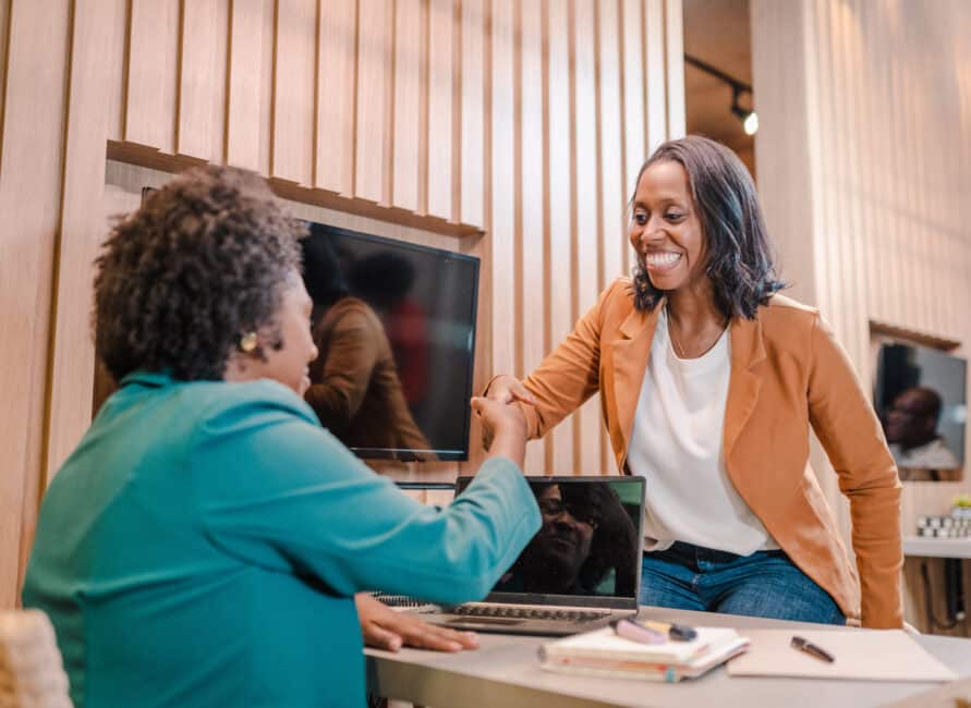 A woman receiving help with her unexpected expenses