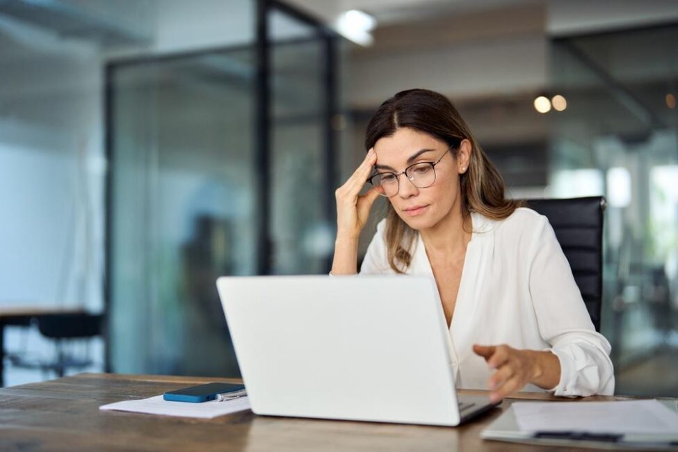 Woman is stressed because the tax deadline is approaching 