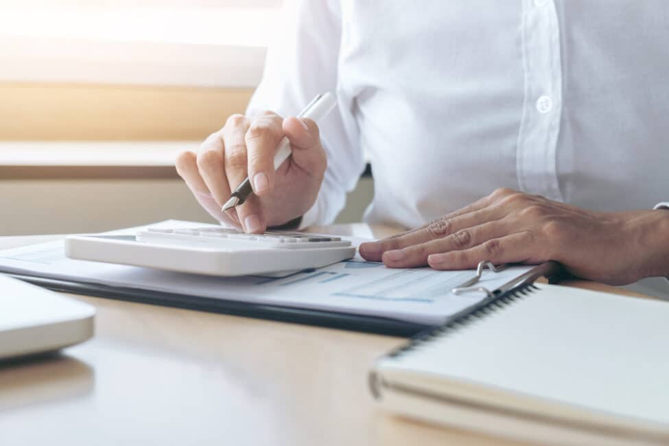 Woman calculating her personal loan interest