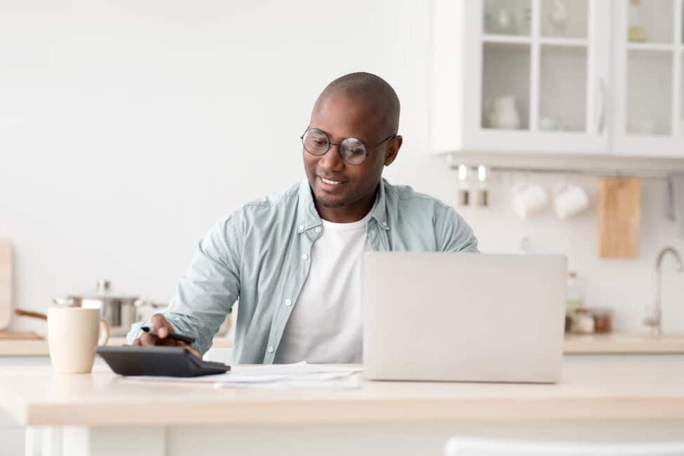 Man calculating his APR for a PAL