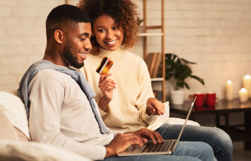 Couple taking advantage of holiday deals online 